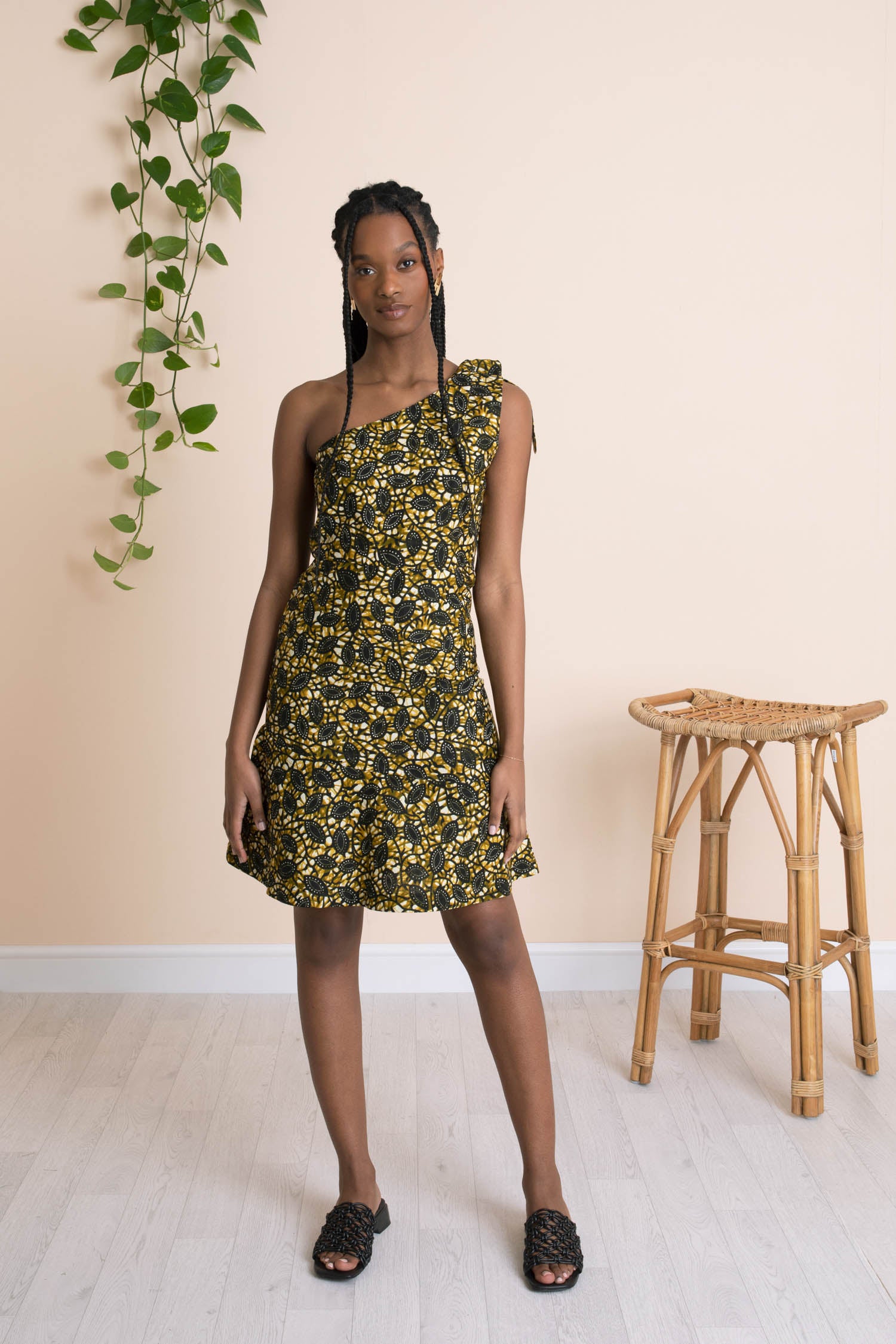 Mayamiko | Yellow and green floral one shoulder bodycon dress with bottom flare Mayamiko | Yellow and green floral one shoulder bodycon dress with bottom flare