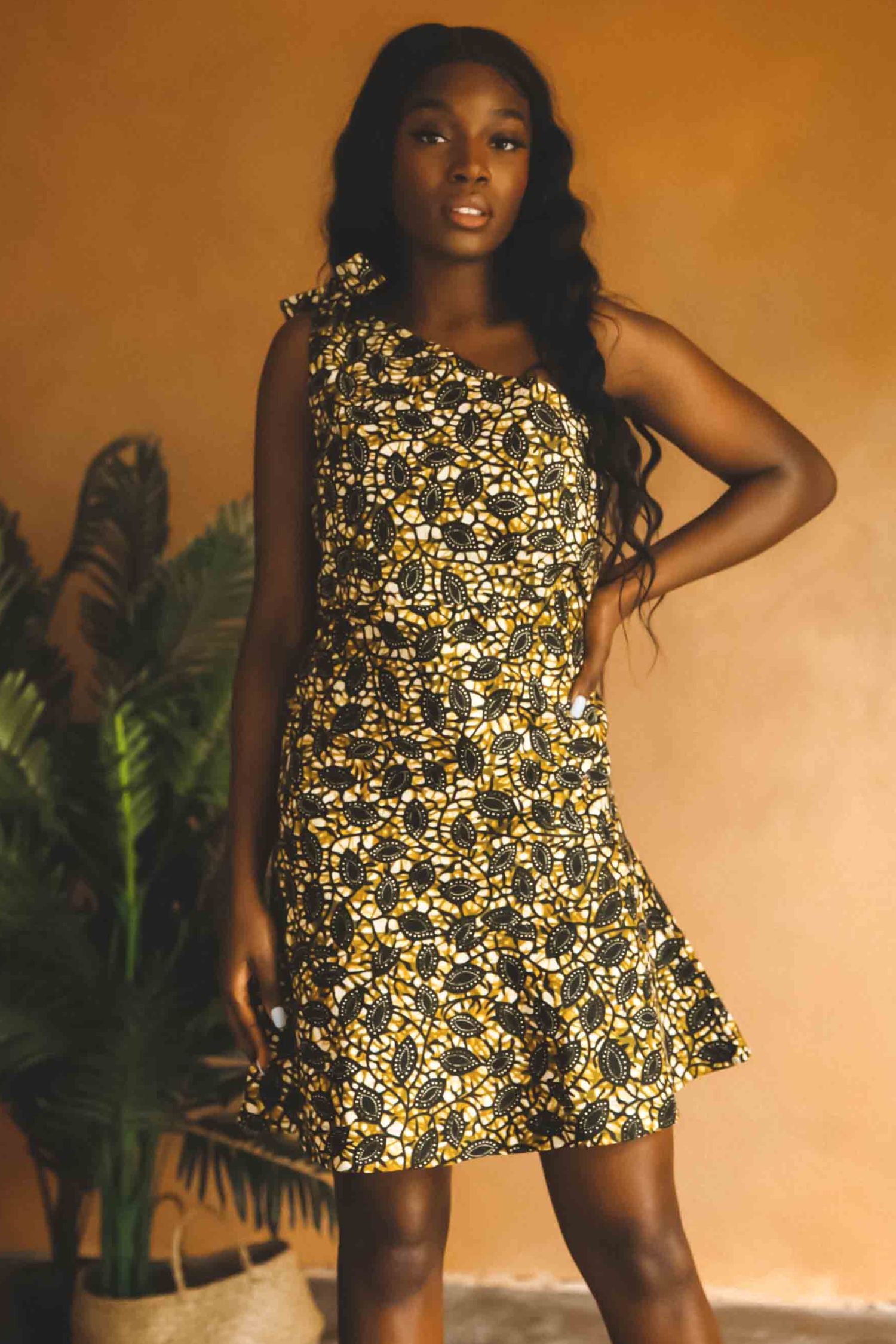 Mayamiko | Yellow and green floral one shoulder bodycon dress with bottom flare Mayamiko | Yellow and green floral one shoulder bodycon dress with bottom flare